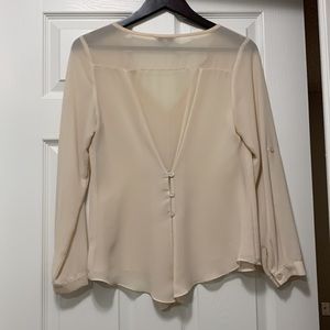 Beautiful cream top with back detail